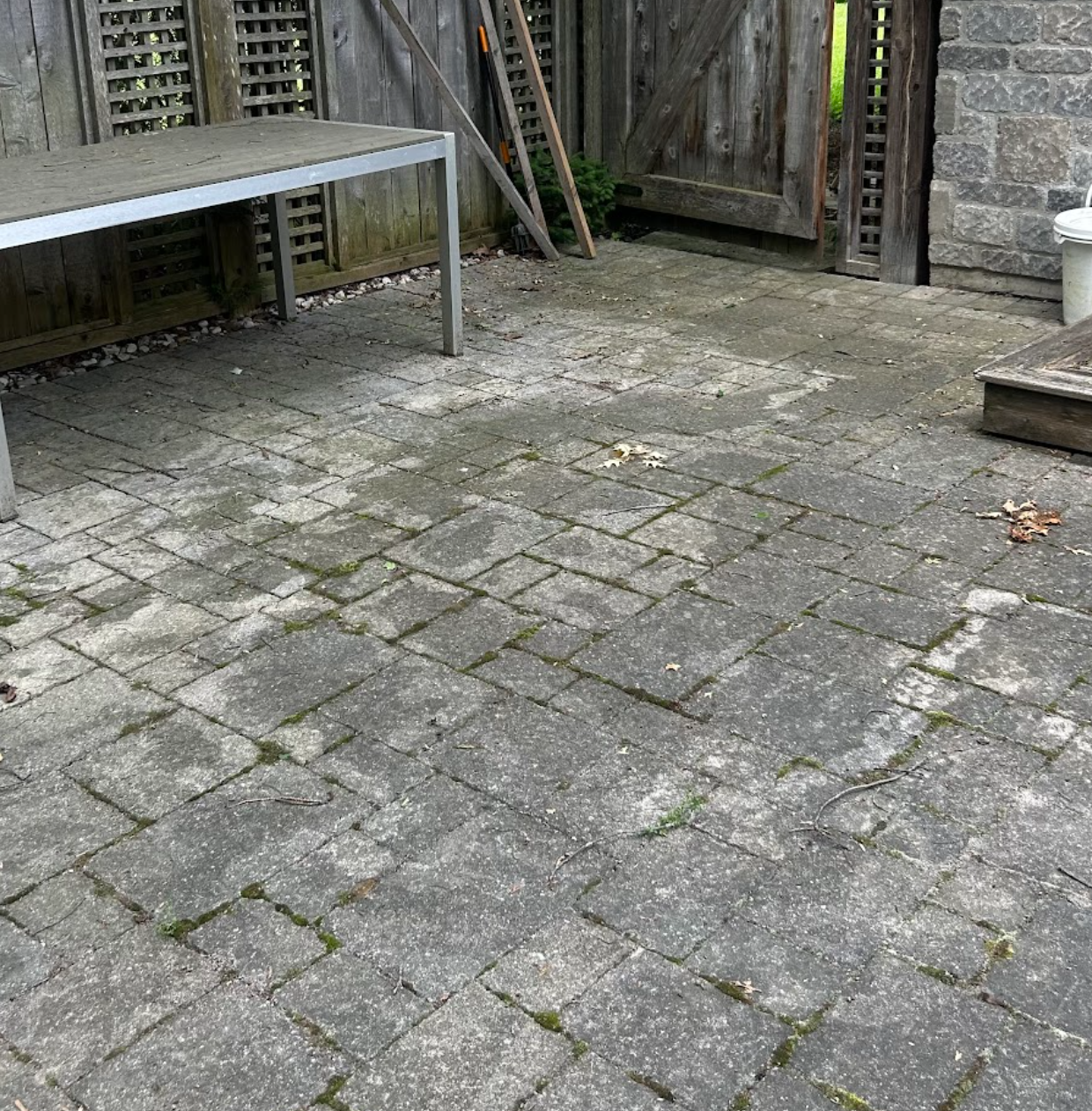 patio surface before powerwashing